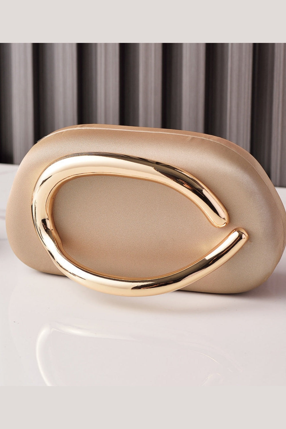 Sleek Structured Clutch Purse Handbag with Gold Sculptural Clasp